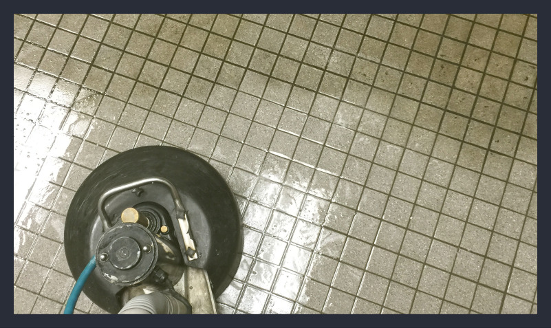 cleaning a dirty bathroom tile floor